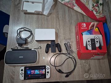 Nintendo switch OLED + custodia + memoria + gioco