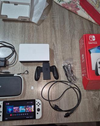 Nintendo switch OLED + custodia + memoria + gioco