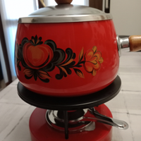 Fornello e pentole per fonduta