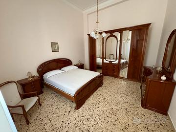 Casa con giardino