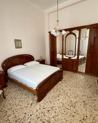 Casa con giardino