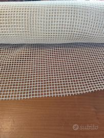 Rete antiscivolo per tappeti