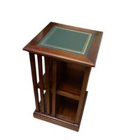 Libreria girevole con piano in pelle