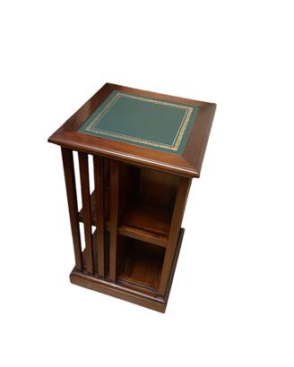 Libreria girevole con piano in pelle