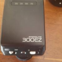 Macchina fotografica con obiettivi, flash,borsa