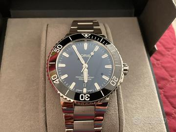 Oris Aquis date