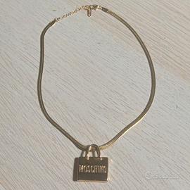 Collana Moschino Dorata acciaio con ciondolo