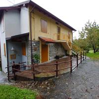 Bilocale con terreni in piccola palazzina