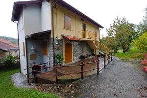 Bilocale con terreni in piccola palazzina