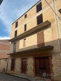 casa e terreno edificabile