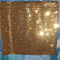 Top a fascia oro