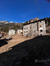 Casa con terreno edificabile