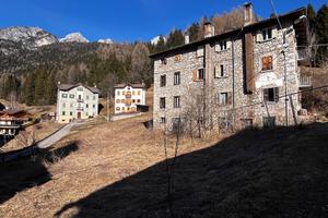 Casa con terreno edificabile