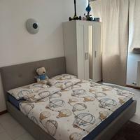 Letto matrimoniale e armadio