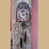 Orologio pitturato con pesi