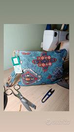 Pochette artigianale azzurra