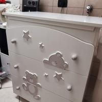 Lettino con sponde e fasciatoio