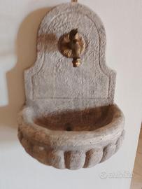 Fontana in pietra cemento con rubinetto artistico