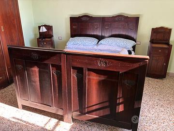 Letto matrimoniale testiera e pediera intagliate