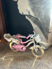 Bicicletta bimba rosa con rotelle