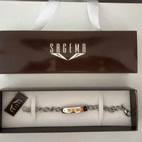 Bracciale Sagema con borchie in oro 18 carati