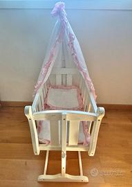 Culla di legno per bambole