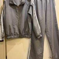 Tuta completa con bande laterali bianche