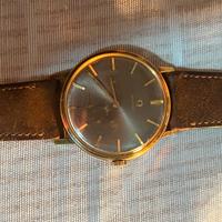 Omega century oro