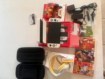 switch oled in garanzia + giochi, custodia cuffie