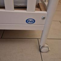 Lettino con sbarre in legno