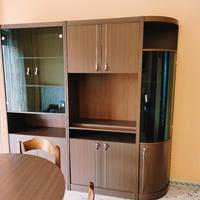 Soggiorno con tavolo allungabile e sedie 