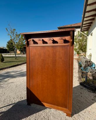 Mobile da ingresso in legno intagliato