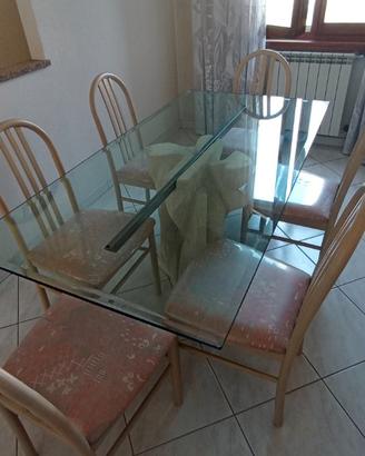 Tavolo in cristallo più mobile e specchio e sedie