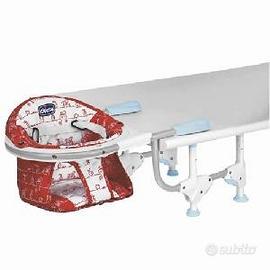 Seggiolino da tavolo e marsupio stokke