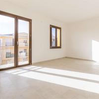 Luminoso quadrilocale con posto auto coperto