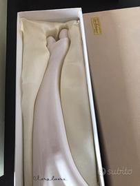 Statua rappresentante donna con bambino