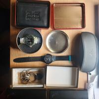 orologi swatch, portafogli levis,timberland armani