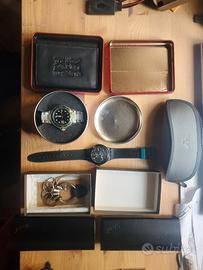 orologi swatch, portafogli levis,timberland armani