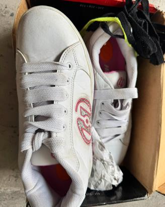 Scarpe con rotella
