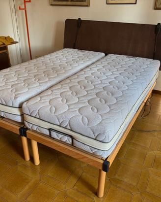 Letto matrimoniale con reti motorizzate