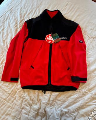 Maglia pile e zaino leggere sotto