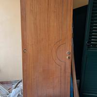 Porta in legno  tamburrata con cerniere a bilico