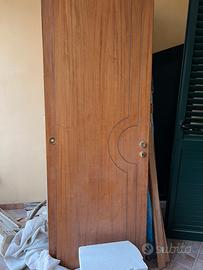 Porta in legno  tamburrata con cerniere a bilico