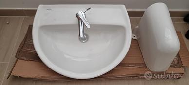 lavandino in ceramica e copri sifone in ceramica