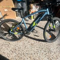 Bicicletta Rockrider eST100 Sport Trail