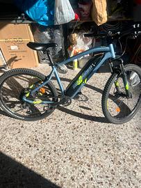 Bicicletta Rockrider eST100 Sport Trail