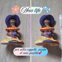 Bambola in ceramica fatta a mano