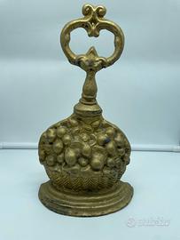 Ferma porta vintage in metallo dorato