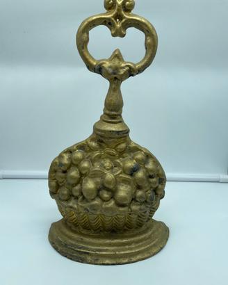 Ferma porta vintage in metallo dorato