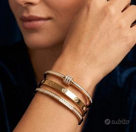 Set di bracciali in acciaio placcato oro e zirconi